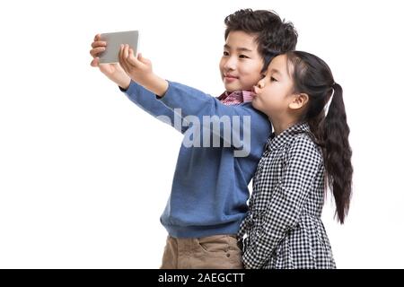 Glückliche Kinder unter selfie Stockfoto
