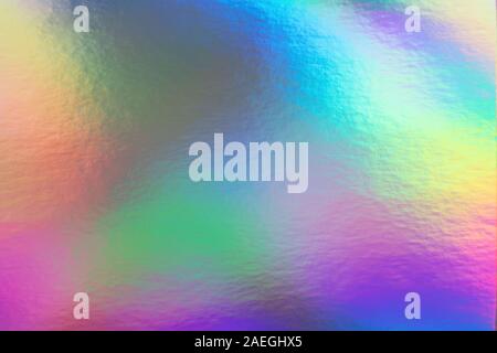 Abstrakter, trendiger Regenbogenhintergrund im 80er-Stil. Verschwommene Textur in violetten, pinken und mintfarbenen Farben mit Kratzern und Unregelmäßigkeiten. Stockfoto