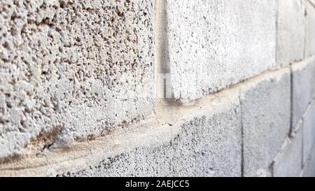 Alte cinder Block Wand, die Ansicht zu schließen. Stockfoto