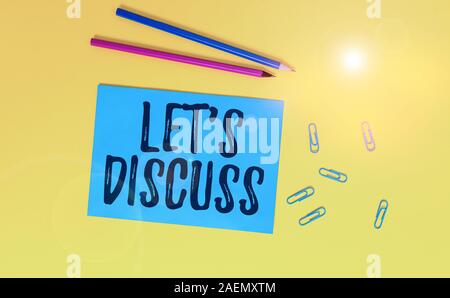 Konzeptionelle Handschrift zeigen lassen Sie uns diskutieren. Konzept Sinn fragen jemanden über etwas mit der Vorführung oder mit leeren Blatt Papier zu sprechen Stockfoto