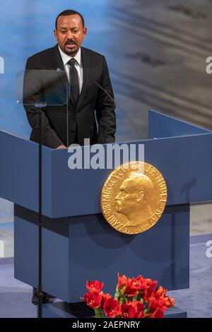 Oslo, Norwegen. 10. Dez 2019. Ahamd Abiy Premierminister Äthiopiens liefert seine Dankesrede bei der Verleihung des Friedensnobelpreises Zeremonie an der Osloer Rathaus in Oslo, Norwegen Credit: Nigel Waldron/Alamy leben Nachrichten Stockfoto