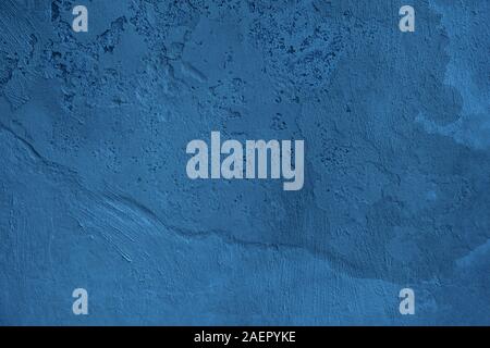 Rauen Beton Wand in blauer Farbe lackiert. Stockfoto