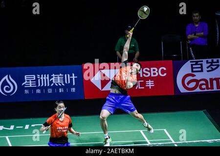 Ren Xiaoyu und Zhou Chaomin von China den Ball gegen Kouhei Gondou und Ayane Kurihara Japans in der ersten Runde des gemischten Doppel von Fuzhou Kinn Stockfoto