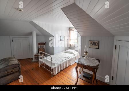 Ruhiges Schlafzimmer im Inneren der Trommel Point Lighthouse, Solomons Island, Maryland Stockfoto