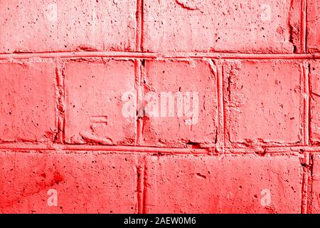 Bemalte Mauer Textur hautnah. Zusammenfassung Hintergrund rot getönt Stockfoto