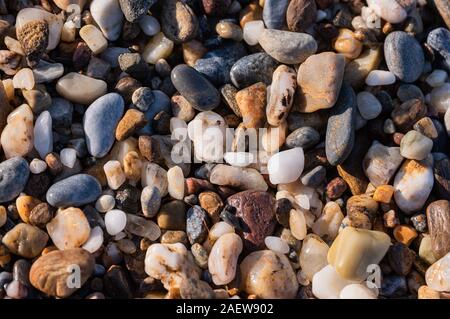 Kieselsteine am Strand. Kann als Muster in der grafischen Arbeiten verwendet werden. Stockfoto