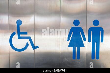 Symbole außerhalb der öffentlichen Toilette, Behinderte, Frauen und Männer. Stockfoto