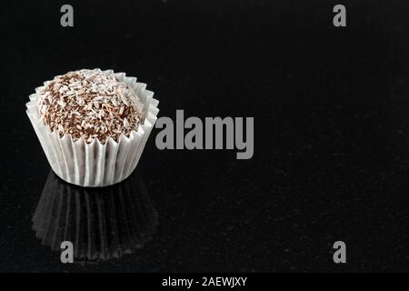 Vier natürliche gesunde Süßigkeit Nahaufnahme Glas schwarz hintergrund Stockfoto