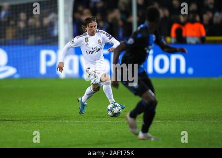 Brügge, Belgien. 11 Dez, 2019. Luca Modric von Real Madrid konkurriert, während eine Gruppe zu einem Spiel der UEFA Champions League 2019-2020 zwischen Club Brugge und Real Madrid in Brügge, Belgien, Dez. 11, 2019. Credit: Zhang Cheng/Xinhua/Alamy leben Nachrichten Stockfoto