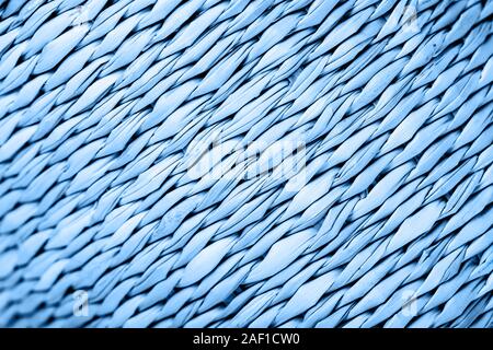 Die Textur der Strohkorb in blauer Farbe. Das Konzept der Sommer, Gartenmöbel, Ferien, Strand, Zubehör usw. Stockfoto