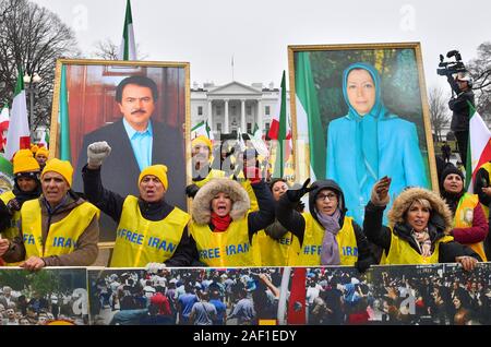 Washington, United States. 12 Dez, 2019. Die Demonstranten halten sie Porträts von iranischen Politiker Massoud Rajavii und seine Frau Maryam Rajavi, wie sie bei einer Rallye durch die Organisation der iranisch-amerikanische Gemeinschaften für einen Regimewechsel im Iran teilnehmen, in Washington, DC, am 8. März 2019. Die Gruppe ruft für ein iranisches Volk Aufstand für einen Regimewechsel in den herrschenden religiösen Partei bringen. Foto von Kevin Dietsch/UPI Quelle: UPI/Alamy leben Nachrichten Stockfoto