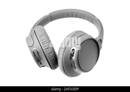 Grau kabellose Kopfhörer auf weißem Hintergrund closeup, große graue Bluetooth headset Design moderne schwarze Wi-fi Stereo Ohrhörer Ansicht von unten Stockfoto