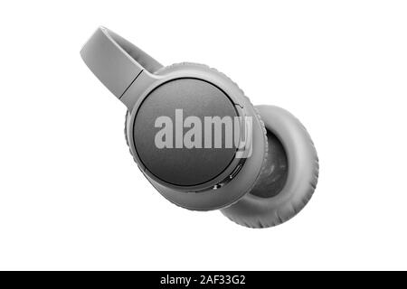 Grau kabellose Kopfhörer auf weißem Hintergrund, große, graue Bluetooth headset Design, moderne schwarze Wi-fi Stereo Ohrhörer Seitenansicht Stockfoto
