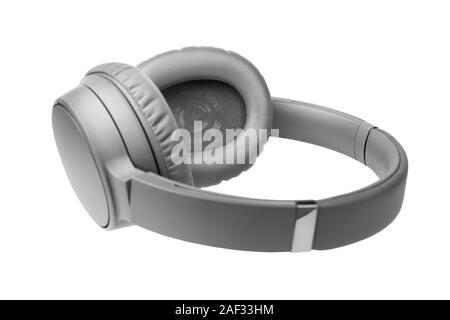 Grau kabellose Kopfhörer auf weißem Hintergrund, große, graue Bluetooth headset Design, moderne schwarze Wi-fi Stereo Ohrhörer Seitenansicht Stockfoto