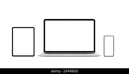 Laptop, Telefon und Tablet isoliert. Moderne Geräte mit dünnen Kanten. Isolierte Bildschirm für Mockup, Anwendung oder Website Präsentation Stockfoto