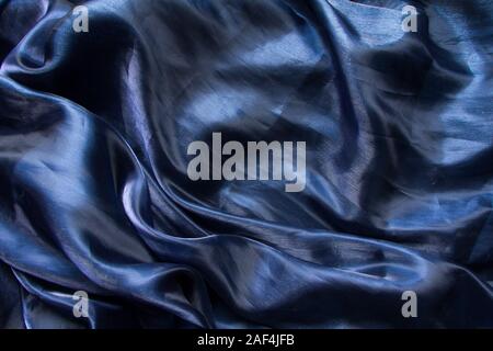 Hintergrund Stoff Falten dunkelblau Tüll oder Organza, selektiven Fokus Stockfoto