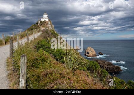 Nugget Point Lighthouse an der Catlins, Otago, Neuseeland Stockfoto