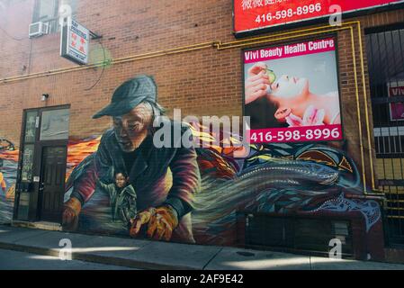 TORONTO, KANADA - November, 2019 Teil der Grafitti in Chinatown Toronto während des Tages Stockfoto