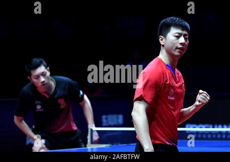 Zhengzhou, Provinz Henan in China. 14 Dez, 2019. Ma Lange von China feiert während der Männer singles im Halbfinale gegen seinen Landsmann Xu Xin am 2019 ITTF World Tour Grand Finals in Zhengzhou, Chinas Provinz Henan, Dez. 14, 2019. Credit: Li Ein/Xinhua/Alamy leben Nachrichten Stockfoto