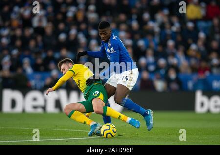 Leicester, Großbritannien. 14 Dez, 2019. Kelechi Iheanacho von Leicester City & Tom Trybull von Norwich City während der Premier League Match zwischen Leicester City und Norwich City für die King Power Stadion, Leicester, England am 14. Dezember 2019. Foto von Andy Rowland. Credit: PRiME Media Images/Alamy leben Nachrichten Stockfoto