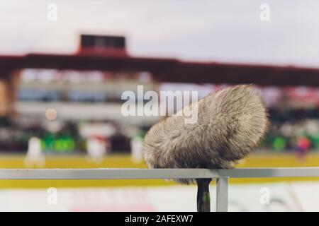 A large microphone boom with windshield for TV or Radio situated at the ground Stockfoto