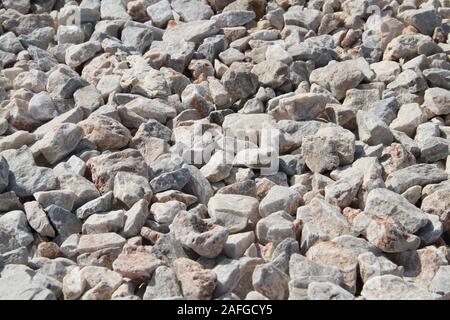 Steine aus einem Steinbruch als Hintergrund Stockfoto