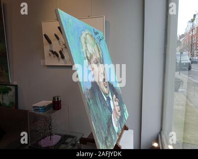 London, Großbritannien. 16 Dez, 2019. Ein Chelsea Galerie ist ein Portrait von Boris Johnson vorne und in der Mitte der Fenster die Johnson Sieg zu feiern. Nach Künstler Gow, wenn Johnson wurde Londoner Bürgermeister, bemalt und durch Johnson selbst unterzeichnet, es hat einen Preis von £ 6000. Die Galerie hat auch eine zweite Gow von Johnson zu einem ähnlichen Preis. Credit: Brian Minkoff/Alamy leben Nachrichten Stockfoto