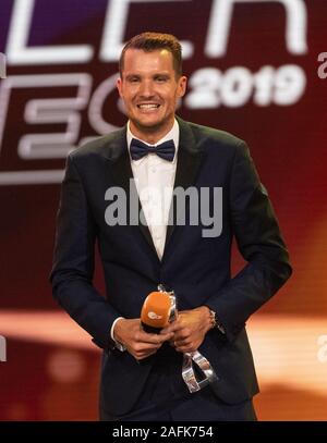 Baden Baden, Deutschland. 15 Dez, 2019. Triathlet Jan Frodeno ist auf der Bühne bei der Preisverleihung für die portswoman des Jahres'. Quelle: Patrick Seeger/dpa/Alamy leben Nachrichten Stockfoto