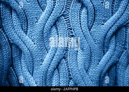 Schöne weiße gestrickte wiederholendes Muster von handgefertigten Textur. Stockfoto