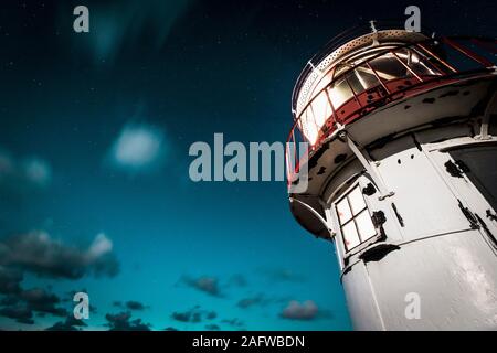 Leuchtturm bei bewölktem Himmel, Norddorf, Schleswig Holstein, Deutschland Stockfoto
