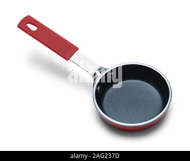 Kleine rote Pfanne isoliert auf weißem Hintergrund. Stockfoto