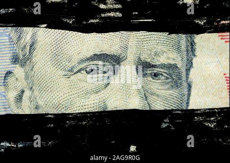 Nahaufnahme des Ulysses s. Grant-Gesichts auf dem Dollarschein mit schwarzen Linien übermalt Stockfoto