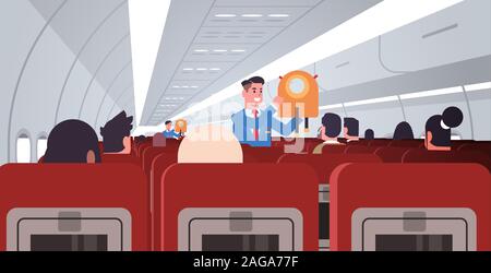 Steward erklären, für Passagiere wie Jacke Schwimmweste in Notsituationen männliche Flugbegleiter in Uniform safety Demonstration Konzept moderne Flugzeug der inneren horizontalen flachen Vector Illustration verwenden Stock Vektor