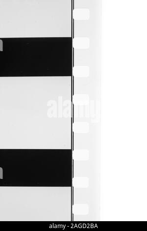 Detail der 35-mm-Film Perforation gauge Schwarz und Weiß leader Kino Hintergrund transparente Kopie Raum Stockfoto