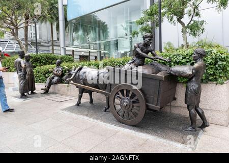 Bronze Statuen des Flusses Händler auf dem Fluss Singen in Singapur Stockfoto