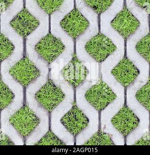Blick von oben auf die umweltfreundliche Parken von konkreten Zellen und Rasen Gras als nahtlose Muster. Geometrische Hintergrund eines grünen städtische Umwelt Stockfoto