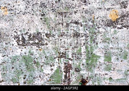 Hintergrund der alten verwitterten Beton in Weiß Grün und Gelb lackiert. Stockfoto