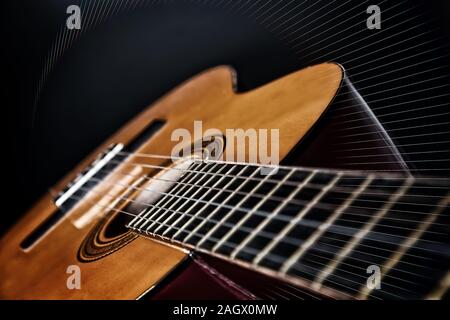 Gitarre closeup mit Strahlen um. Musikalische Konzept. Verarbeitung mit Bleach Bypass Wirkung Stockfoto