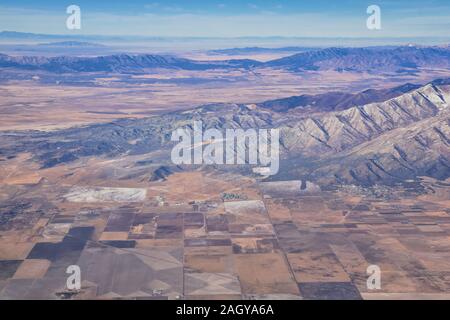 Rocky Mountains, Oquirrh Bereich Luftaufnahmen, Wasatch Front Rock aus dem Flugzeug. South Jordan, West Valley, Magna und Herriman, von der Großen Salz See U Stockfoto