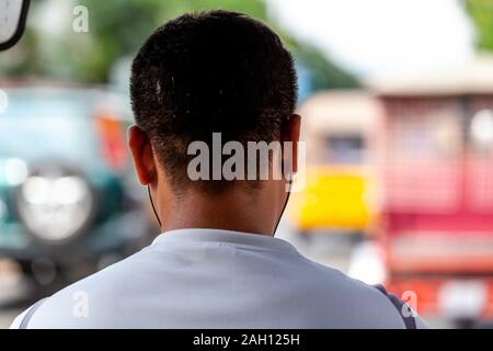 Ein Bild von einem Tuk Tuk Fahrer, Phnom Penh, Kambodscha. Stockfoto