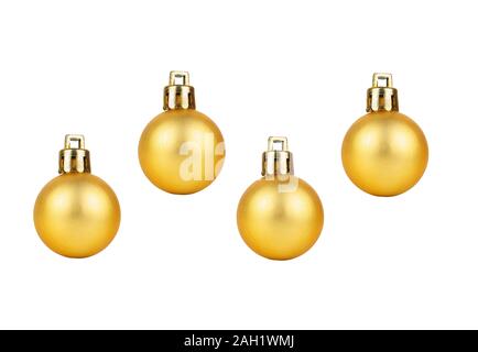 Vier goldene Weihnachtskugeln isoliert auf weißem Hintergrund Stockfoto