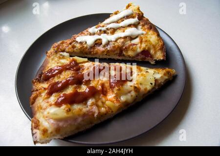 Pizzastücke Stockfoto
