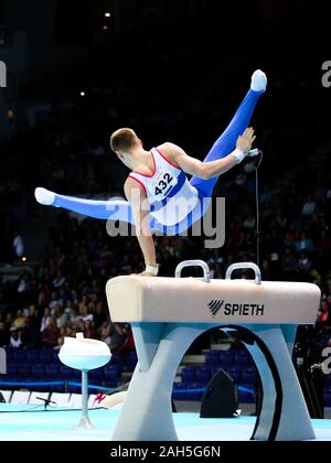 Stettin, Polen, 13. April 2019: Russische Athleten Vladislav Poliashov konkurriert auf dem Pferd während der künstlerischen Gymnastik Meisterschaften Stockfoto