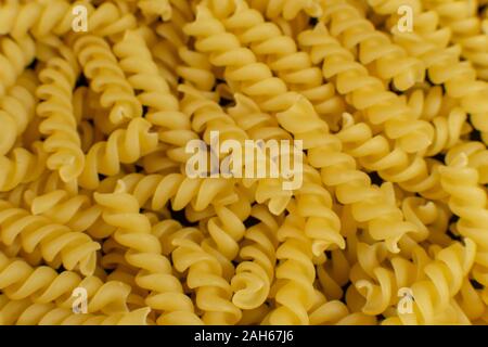 Hintergrund Durch die spiralförmige Pasta gebildet Stockfoto