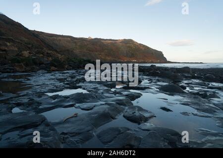 Port Mulgrave ist ein heruntergekommener ehemaliger Eisenstein ausführenden Port auf der North Yorkshire Küste auf halbem Weg zwischen Staithes und [Songbook] Bay im Hinderwell Stockfoto