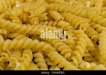 Hintergrund Durch die spiralförmige Pasta gebildet Stockfoto