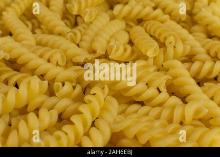 Hintergrund Durch die spiralförmige Pasta gebildet Stockfoto