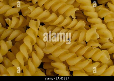Hintergrund Durch die spiralförmige Pasta gebildet Stockfoto