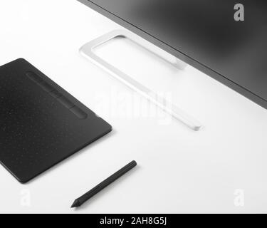 Grafik Tablett Stift und überwachen, die auf einem weißen Tisch auf einem weißen Tisch Stockfoto