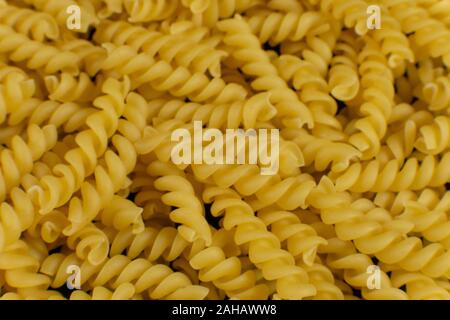 Hintergrund Durch die spiralförmige Pasta gebildet Stockfoto